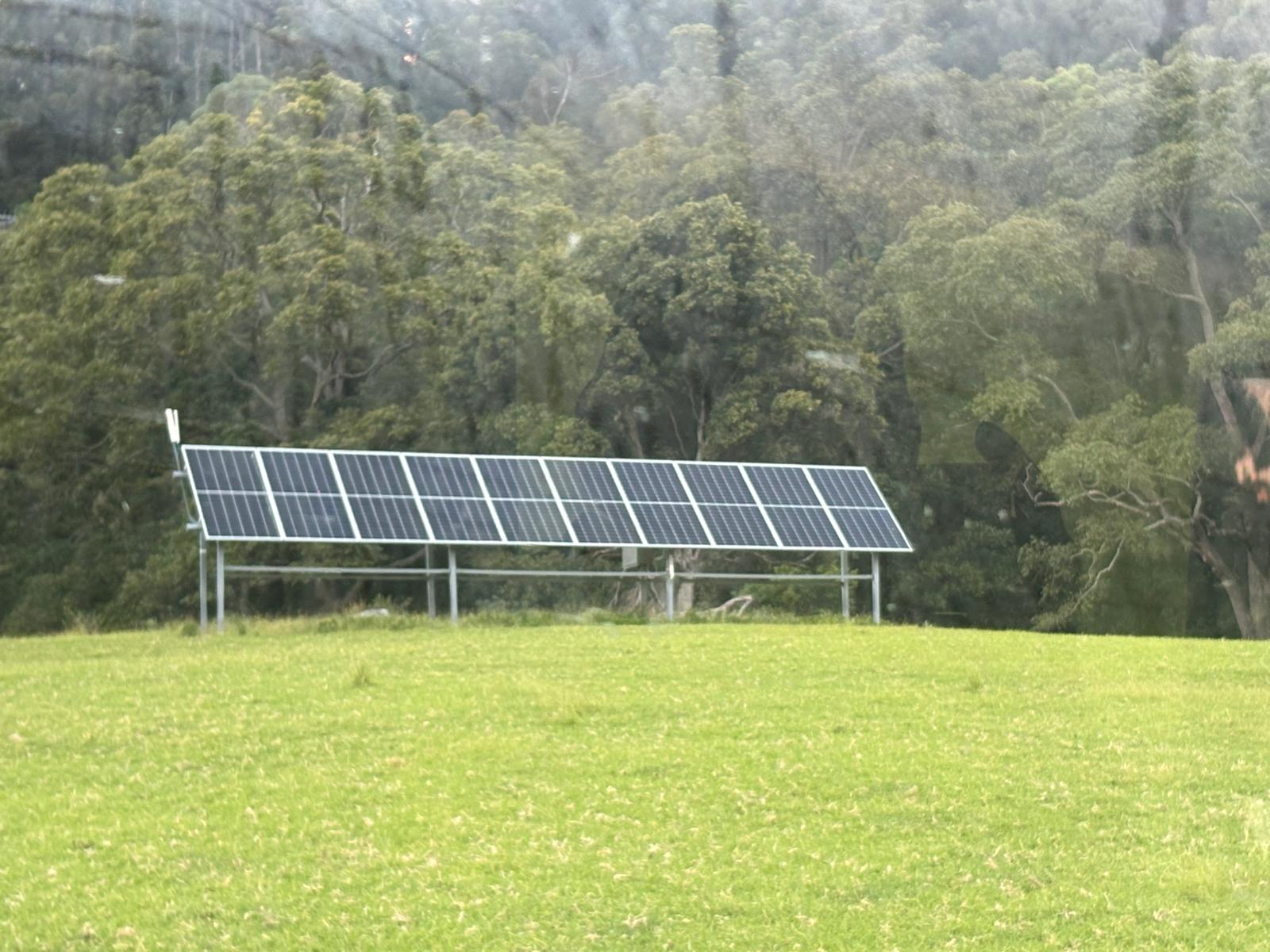 Ground-mounted solar array on a farm